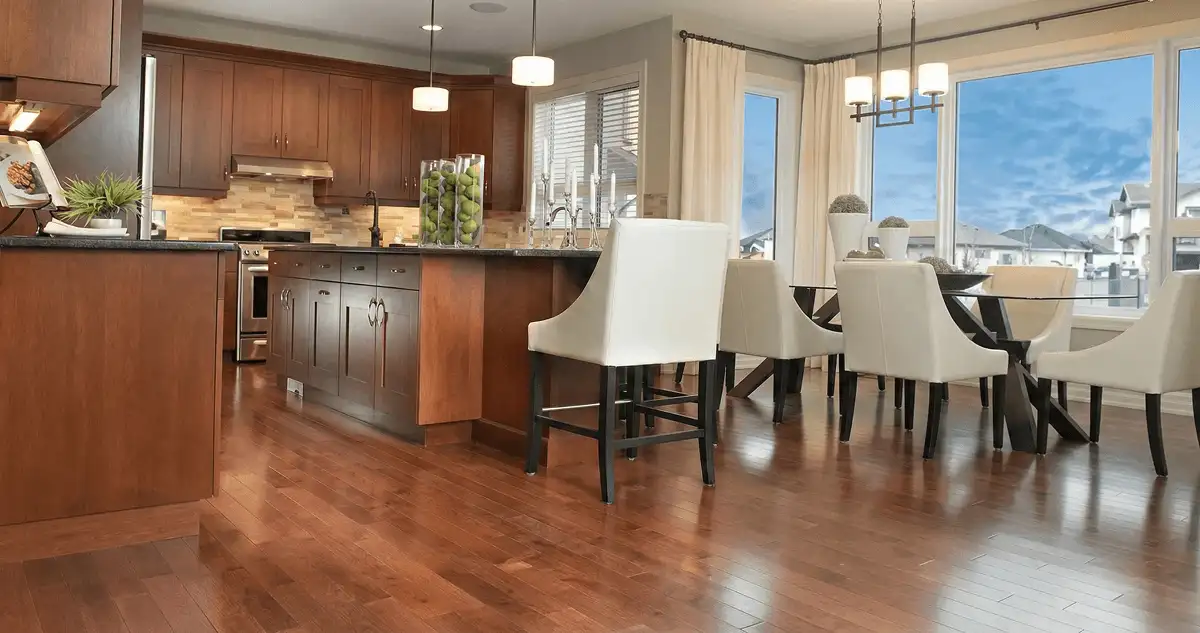 A modern kitchen with professionally installed wood flooring in Baton Rouge, LA