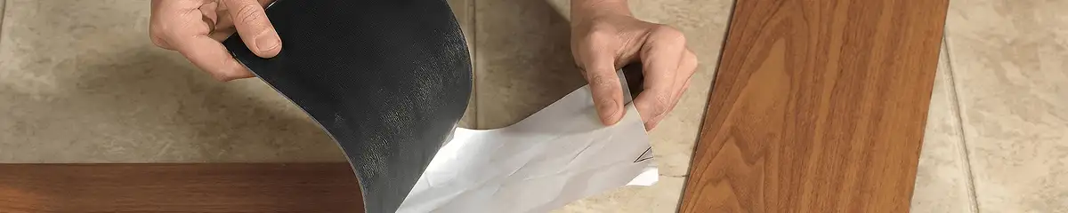 A professional installing vinyl flooring in Baton Rouge, LA